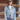 Woman wearing a light blue suede embroidered  jacket with patches, jeans, and a  Texas Embroidered Trucker Hat - Gold/Olive-FleaStyle