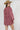 A woman wearing a feminine soft floral corduroy mini dress with tie and billowy sleeves a tan cowboy hat-Floral Corduroy Mini Dress-Floral Corduroy Mini Dress-FleaStyle