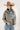 Woman wearing a Washed Quilted Front Tie Puffer Jacket, blue jeans, and a tan straw cowboy hat-FleaStyle