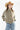 Woman wearing a Washed Quilted Front Tie Puffer Jacket, blue jeans, and a tan straw cowboy hat-FleaStyle