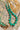 A rich emerald-green graduated beads with subtle gold-tone spacer accents throughout displayed on a vintage patterned book cover alongside matching green beads and amber glass beads-Vintage Emerald Green Beaded Necklace-FleaStyle