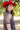 A woman red curl brim cowboy hat and a sheer leopard-print dress with a high ruffled collar and cowboy boots in a field-Rider_Wool_Cowboy_Hat_-_Red-FleaStyle