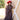 A woman wearing a red curl brim cowboy hat and a sheer leopard-print dress with a high ruffled collar and ruffled hem paired with cowboy boots in a field-Rider_Wool_Cowboy_Hat_-_Red-FleaStyle