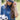 Woman wearing a Futbol-Ya_ll-Canvas-Trucker-Hat- cap with text, holding a soccer ball outdoors-Fleastyle.