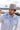 Man wearing a light blue patterned shirt and Jenner Cowboy Cashmere Wool Hat - Stone by a the shoreline-FleaStyle