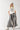 Woman wearing a 'Texas Y'all' t-shirt, striped skirt, cowboy boots and a Concho Disc Belt - Silver and Black-Fleastyle