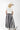 Woman wearing a 'Texas Y'All' shirt and a Stripe-Flare-Maxi-Skirt-Black_Cream-Fleastyle