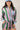 Woman wearing a green and pink striped shirt and shorts set with a blue cap cowboy boots,  Striped Elastic Waist Shorts - Green/Pink-Fleastyle.