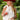 Woman wearing a red cowboy hat, white bow top, and blue jean shorts, holding a cherry drink and a basket outdoors-Fleastyle