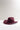 A curl-brimmed western cowboy hat in a maroon color, photographed on a clean white surface against a light gray background--Rider_Wool_Cowboy_Hat_-_Maroon-FleaStyle.