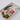  A Boheminan Hat Styling Kit containing various hat-styling accessories including fabric hat bands, feathers, a playing card, matches and a silver rhinestone pearl  brooch-Bohemian_Hat_Styling_Kit_-_Gold_Leaf_Brooch-FleaStyle