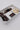 A hat kit containing  feathers, hat bands, a playing card, matches and a god star brooch for hat decorating-Rocker-Hat-Styling-Kit-Gold-Star-Brooch-FleaStyle