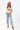 A woman wearing an ivory "Dolly" graphic t-shirt, a pink cowboy hat and a flattering high-rise relaxed wide-leg jean with oversided cuffs for an effortlessly cool look-Super High Rise Cuffed Baggy Straight Jeans-FleaStyle