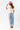 A woman wearing an ivory "Dolly" graphic t-shirt, a pink cowboy hat and a flattering high-rise relaxed wide-leg jean with oversided cuffs for an effortlessly cool look-Super High Rise Cuffed Baggy Straight Jeans-FleaStyle