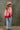 A woman wearing an ivory "Dolly" graphic t-shirt, a pink cowboy hat and a flattering high-rise relaxed wide-leg jean with oversided cuffs for an effortlessly cool look-Super High Rise Cuffed Baggy Straight Jeans-FleaStyle