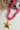 Beaded Necklace with Star Pendant - Hot Pink on a white surface with seashells and rope-Fleastyle.