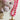 Beaded Necklace with Star Pendant - Hot Pink on a white surface with seashells and rope-Fleastyle