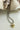 Mixed Metal Heart Ball Chain Choker Necklace with a gold heart charm on a white surface with natural elements-Fleastyle
