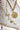 Medallion Pendant Curb Chain Necklace - Gold on a textured surface-Fleastyle