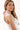 Woman wearing a white tank top, blue jeans and a Horseshoe Charm Scarf Necklace - Blue/Coral Bandana - Fleastyle