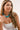 Woman wearing a Chunky Beaded Choker Necklace Turquoise against a plain background--Fleastyle