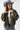 A woman wearing a classic long-sleeve tee features a flattering, fitted silhouette with an elegant boat neckline worn alone or styled as an effortless layering piece--Boat_Neck_Long_Sleeve_Top_-_Ivory-FleaStyle