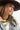 Woman wearing a painted flat-brimmed hat and Love Statement Charm Necklace Gold and layered necklaces -Fleastyle