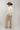 A woman wearing a lightweight jacket with intricate paisley embroidery and embellishments, relaxed, easy fit and brown straw cowboy ha-Embroidered_Paisley_Print_Jacket_-_Ivory-FleaStyle