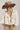 A woman wearing a lightweight jacket with intricate paisley embroidery and embellishments, relaxed, easy fit and brown straw cowboy ha-Embroidered_Paisley_Print_Jacket_-_Ivory-FleaStyle