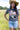Woman wearing a camel cowboy hat and Choosin_Texas-Graphic-T-Shirt-Yellow in a field-Fleastyle