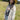 Woman wearing a camel cowboy hat and Choosin_Texas-Graphic-T-Shirt-Yellow in a field-Fleastyle