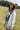 Woman wearing a camel cowboy hat and Choosin_Texas-Graphic-T-Shirt-Yellow in a field-Fleastyle