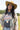 Woman wearing a camel cowboy hat and Choosin_Texas-Graphic-T-Shirt-Yellow in a field-Fleastyle