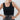 A woman wearing  an ivory cowboy hat, and wide-leg patterned pants and a form-fitting knit tank featuring a flattering scoop neckline with studded detailing for a subtle western edge-Studded Knit Tank Top - Black-FleaStyle