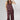 A woman wearing a burgundy strapless top and matching bottoms with a pink polka dot pattern, wearing a  baseball cap with "92651 LAGUNA BEACH" logo, and a pink beaded necklace with a gold star pendant-FleaStyle-Polka Dot Wide Leg Pants - Burgundy/Pink-Fleastyle