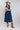 Woman wearing a Lace-Up-Corset-Midi-Dress-Dark-Denim and gray flat brim hat -Fleastyle