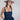 Woman wearing a Western-Ivory-Stone-Bolo-Tie, a Lace-Up-Corset-Midi-Dress-Dark-Denim and gray flat brim hat -Fleastyle 