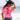 A woman standing on a beach wearing a bright pink t-shirt with a red poppy graphic, denim shorts, and a Roger-Cowboy-Straw-Hat-Black-FleaStyle