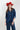 Woman wearing a red cowboy hat and -Chambray-Studded-Button-Down-DarkDenim-Fleastyle