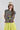 Woman wearing a You-Shook-Me-All-Night-Long-Boxy-Muscle-Tee and lime striped skirt with a beige trucker cap-Fleastyle