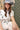 Woman wearing a white Floral-Print-Midi-Shirt-Dress-with-Belt-White and dusty blue decorated cowboy hat-FleaStyle