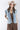 Woman wearing a Washed Denim Quilted Vest, brown dress  and decorated beige cowboy hat-FleaStyle