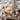 Interior of The Original Hat Bar with hat accessories, boxes, clothing, and brushes on display for custom hat styling